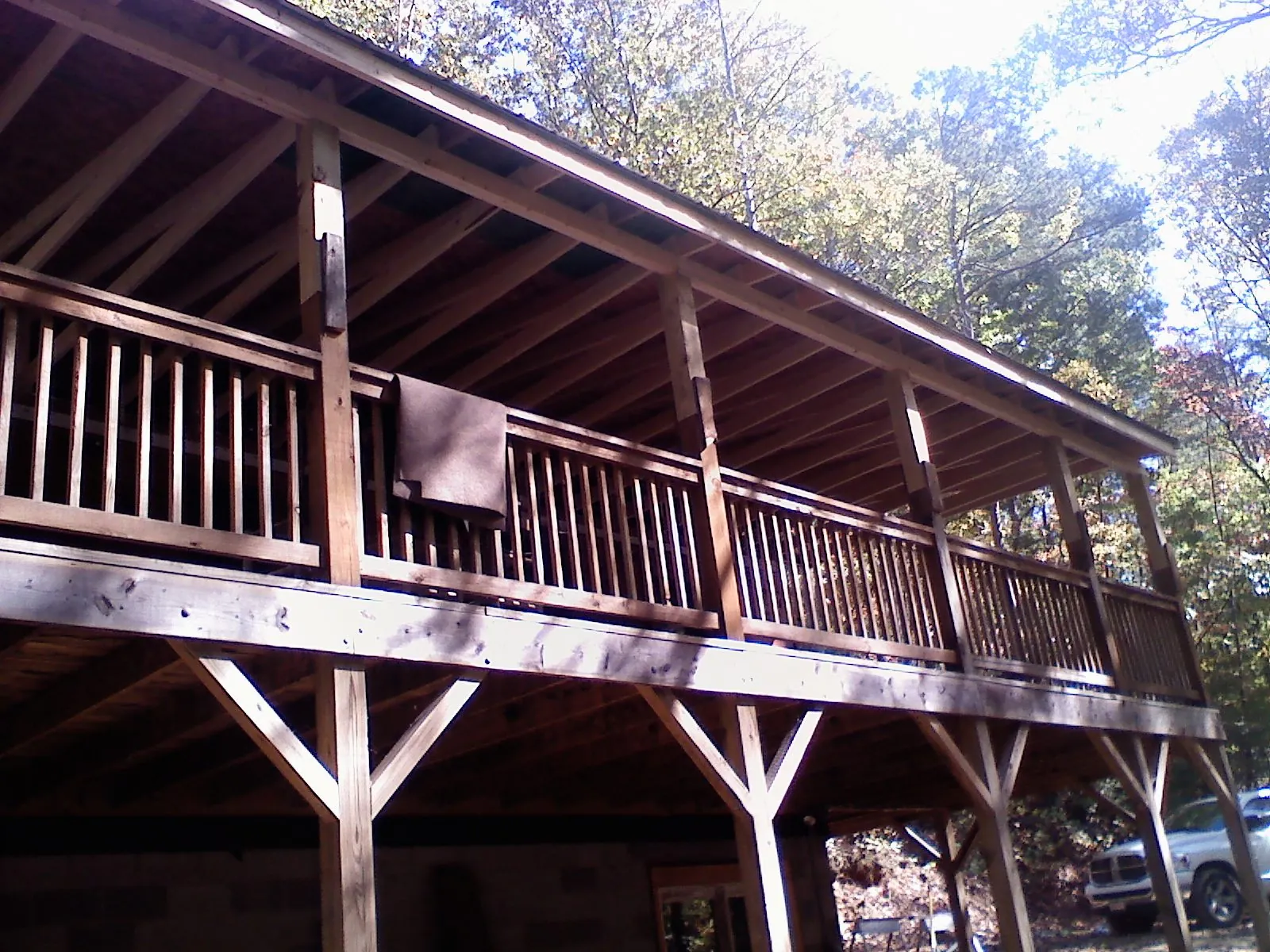 Timber framing under a new elevated porch and deck — Roof Leak Repair in Mars by Roofing Brothers